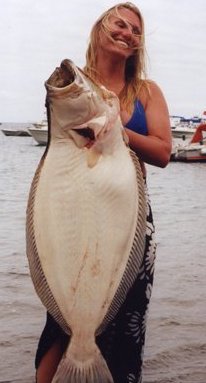 Julie Riffe with a solid Halibut from California. This chick is seriously badass. 